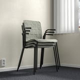 Stacked LÄKTARE conference chairs, light grey fabric, black metal frame, armrests visible, suitable for office or meeting spaces.