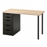 An ikea LAGKAPTEN desk, light wood, black drawers, with metal legs, rectangle, minimalist design.