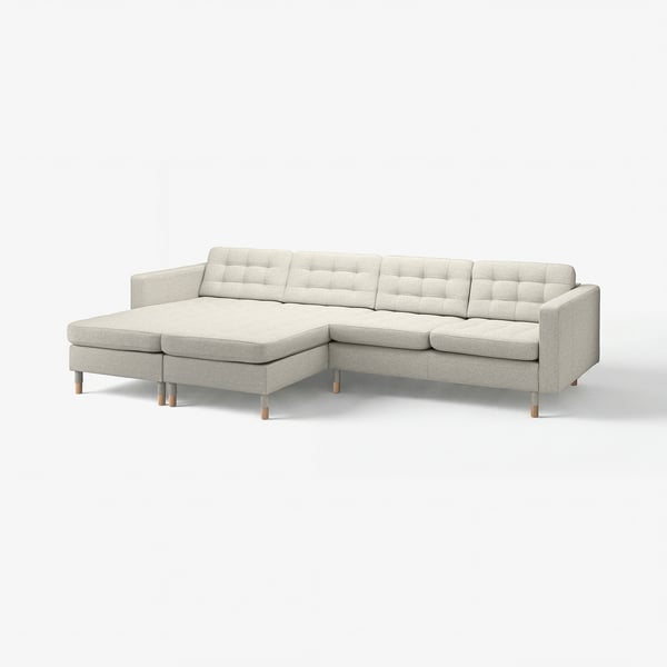 Light grey modern l-shaped sofa with tufted back and seat cushions, wooden legs.
