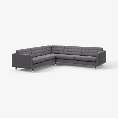 Modern dark grey corner sofa with chrome legs, tufted back, and boxed seat cushions.