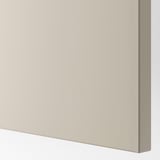 Smooth light gray-beige cabinet front, well-crafted with minimal design, showing high-quality finish.