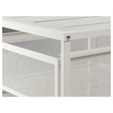 Close-up of white metal mesh storage unit; shows sturdy screws & clean finish.