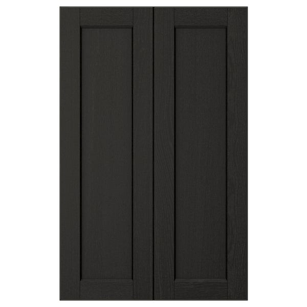 Black LERHYTTAN kitchen cabinet doors feature solid wood with bevelled edges and ash veneer panels, displaying a timeless, rustic design.