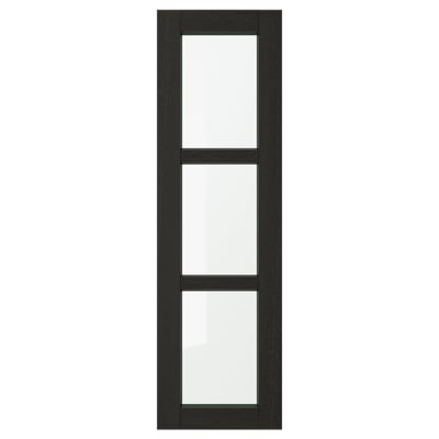 A LERHYTTAN black kitchen cabinet door with a wooden frame, bevelled edges, and glass panels.
