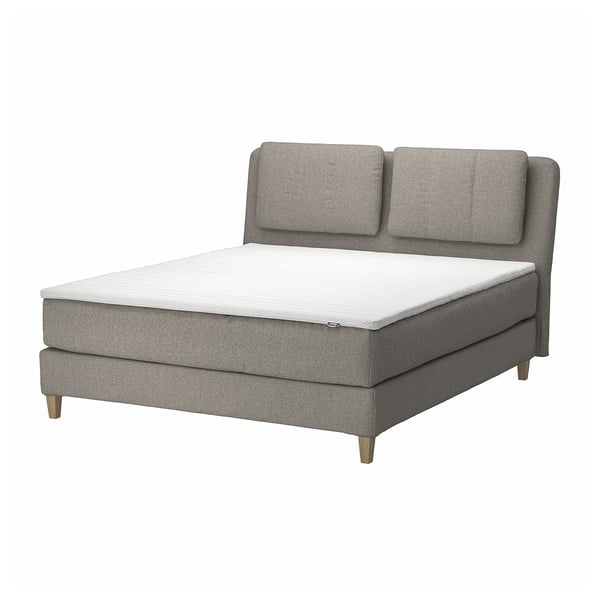 Modern grey divan bed with sloped headboard, upholstered in recycled polyester, featuring removable cushions.