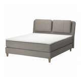 Modern grey divan bed with sloped headboard, upholstered in recycled polyester, featuring removable cushions.