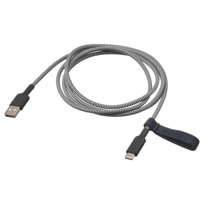 Black & white braided usb charging cable with usb-a & c connectors, rubberized ends, attached strap, 1. 5m length.