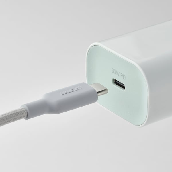 Usb-c cable connector plugged into a 30w charger.