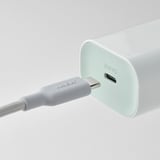 Usb-c cable connector plugged into a 30w charger.