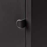 Black metal cabinet door with sleek, modern, half-moon-shaped handle.