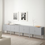 Gray LIXHULT storage cabinet with multiple compartments, displayed in minimalist space.
