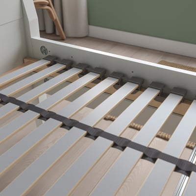 This image shows a LÖNSET slatted bed base with curved and adjustable slats for spine alignment and comfort. The head section is raised.