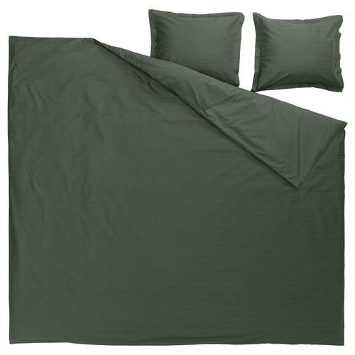Dark green waffle-weave duvet set with pillows, made from 100% soft cotton.