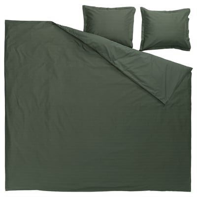 Dark green waffle-weave duvet set with pillows, made from 100% soft cotton.