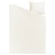 A LUKTVICKER duvet cover set in white with a waffle texture made from soft 100% cotton, designed for comfort.