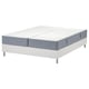 LYNGÖR bed base and mattress combo. Has white base, grey border, four legs. Mattress has five comfort zones.