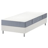 White LYNGÖR bed frame with grey mattress, featuring pocket springs and flat slats.