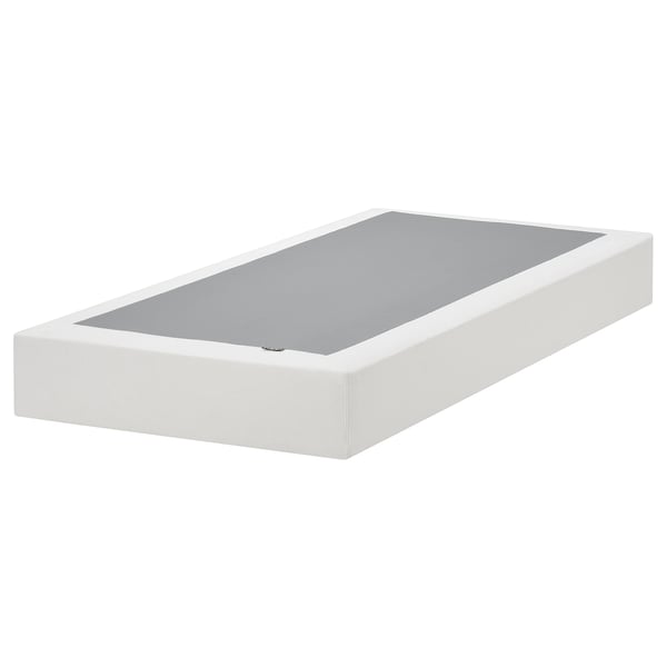 The LYNGÖR bed base is white and rectangular, featuring a simple, clean design with a removable washable cover and flat slats for mattress support.