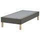 Gray upholstered bed base with wooden legs, minimalist design.