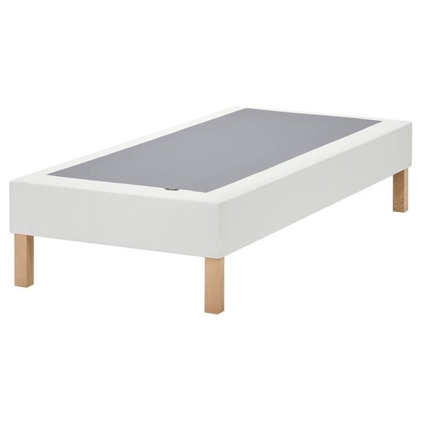 A white LYNGÖR bed base with wooden legs, designed to elevate and support mattresses.