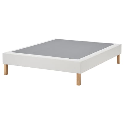 White flat-pack bed base, oak legs, upholstered top.