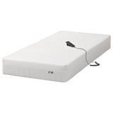 White ikea MAJSKÄR electric foam mattress with remote control.