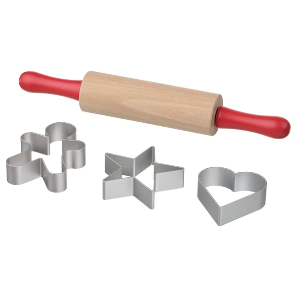MÅLA baking tools: a wooden rolling pin with red handles, and metal cookie cutters in shapes of star, heart, and snowman.