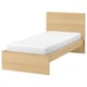 A wooden bed named MALM with a white mattress. The bed frame is light brown with a simple, clean design. Theres a high headboard and no footboard.