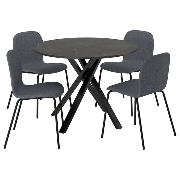 A modern, round black dining table with a sleek, x-shaped steel base and four matching grey fabric chairs with metal legs.