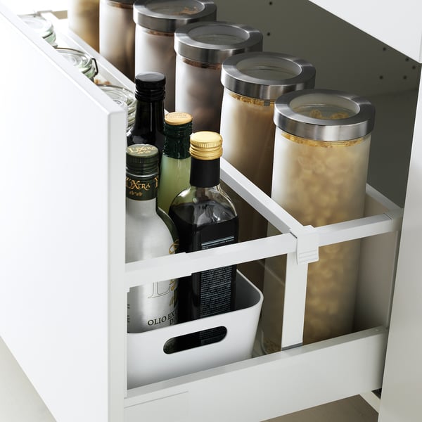 Kitchen drawer with organizer, showing maximized space usage, soft-close feature, and visible contents.