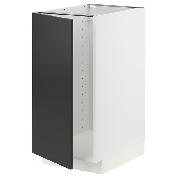 A white METOD kitchen cabinet with a matt black door. Its a modern, rectangular design.