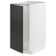 A white METOD kitchen cabinet with a matt black door. Its a modern, rectangular design.