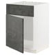 A white METOD kitchen cabinet with a dark grey concrete effect door, featuring clean lines and a modern design.