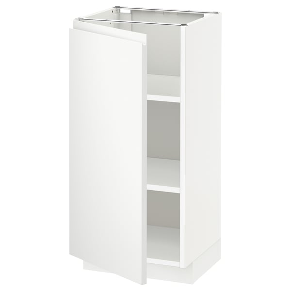 A white METOD kitchen cabinet with a minimalist design and adjustable shelves. It a modern, clean aesthetic with no visible handles.