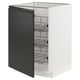 A white METOD kitchen cabinet with a black door featuring a modern design and metallic handles. It has multiple wire shelves inside.