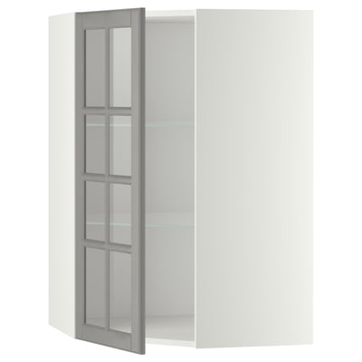 Open white METOD kitchen cabinet with grey bodbẙn glass door featuring beveled edges.