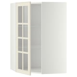 A white METOD kitchen corner cabinet with glass doors, featuring a traditional design with adjustable shelves.