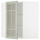 A green ikea METOD kitchen cabinet with adjustable shelves and a glass door in a grid pattern.
