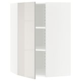 A white METOD kitchen cabinet with a modern, sleek design. The cabinet a high gloss grey door and is adjustable inside.
