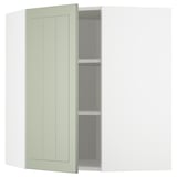 Ikea METOD green cabinet with adjustable shelves.
