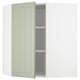 Ikea METOD green cabinet with adjustable shelves.