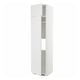 A white METOD kitchen cabinet with adjustable shelves and reversible doors.