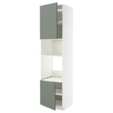 Displays a tall, narrow white cabinet with green doors. One door is open, revealing the shelf inside. The unit has two adjustable shelves.