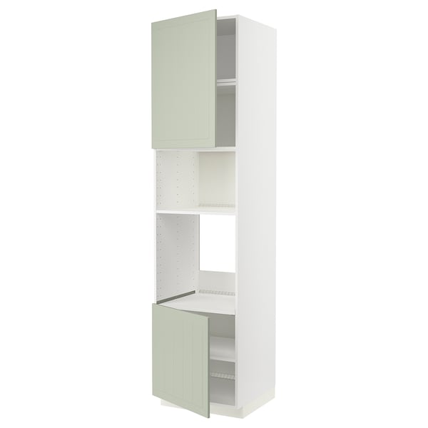 White & green METOD kitchen cabinet with two doors.