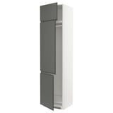 A white and dark gray METOD kitchen cabinet with integrated handles. It two doors and adjustable shelves.