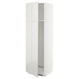 A tall white kitchen cabinet with a high-gloss finish, featuring a single door and adjustable shelves.