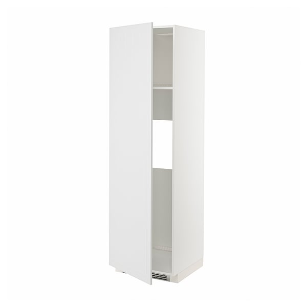 A white METOD kitchen cabinet with a door open, revealing adjustable shelves.