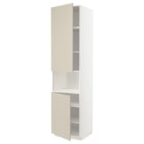 A METOD kitchen unit with beige havstorp doors, featuring two open compartments and an adjustable shelf inside, all in a clean, modern design.