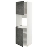 A white METOD kitchen cabinet with dark grey concrete effect doors, featuring adjustable shelves and a modern design.