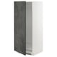 Modern kitchen cabinet with sleek swing door, white frames, grey concrete doors.